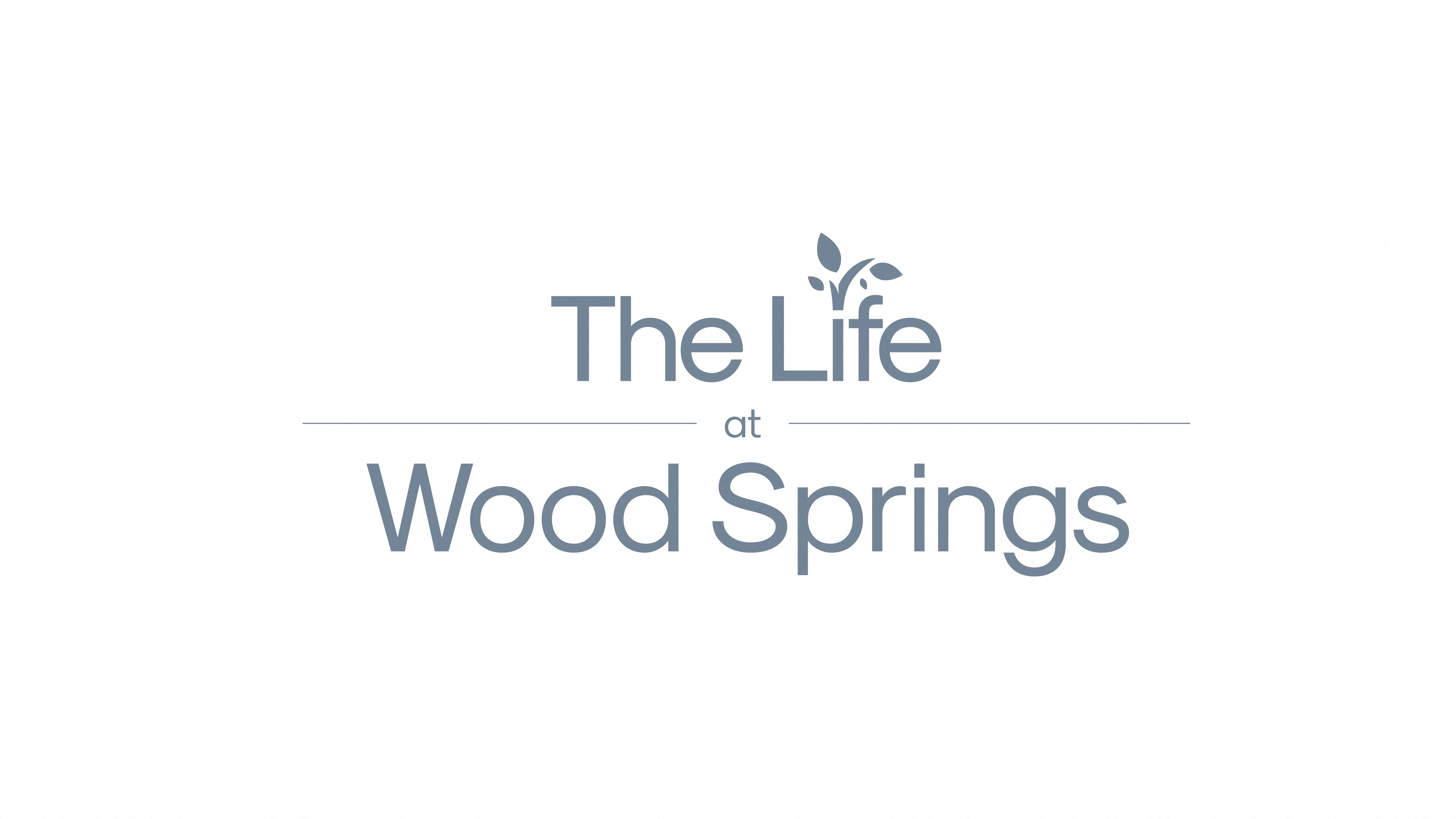 the life at wood springs logo
